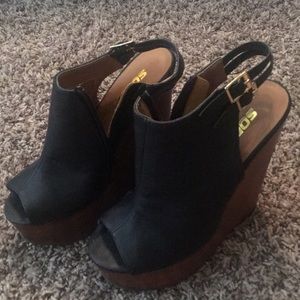 Black leather wedges